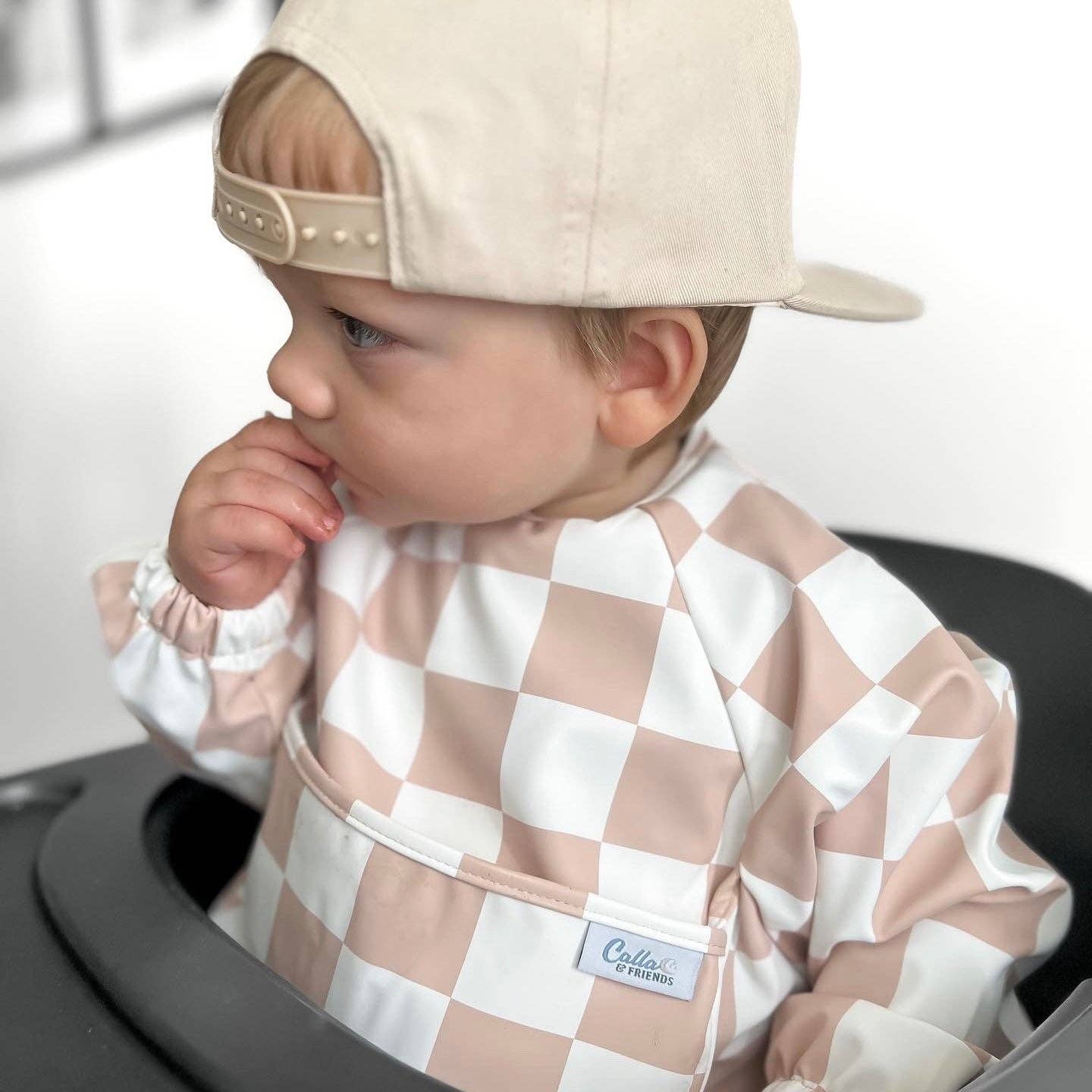 The Grayson Long Sleeve Bib - Checkered: Petal Pink / 4-6Y