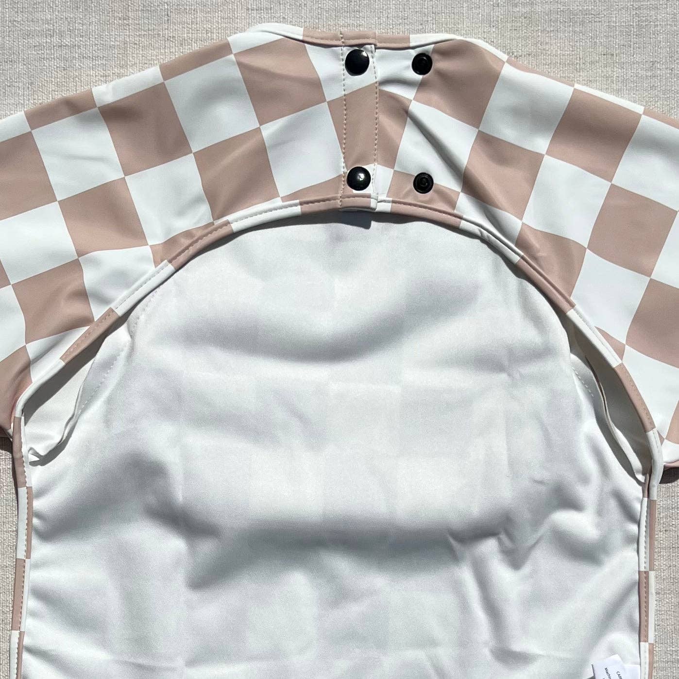 The Grayson Long Sleeve Bib - Checkered: Petal Pink / 4-6Y